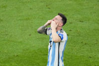 Argentina's Lionel Messi celebrates at the end of the World Cup final soccer match between Argentina and France at the Lusail Stadium in Lusail, Qatar, Sunday, Dec. 18, 2022. (AP Photo/Hassan Ammar)