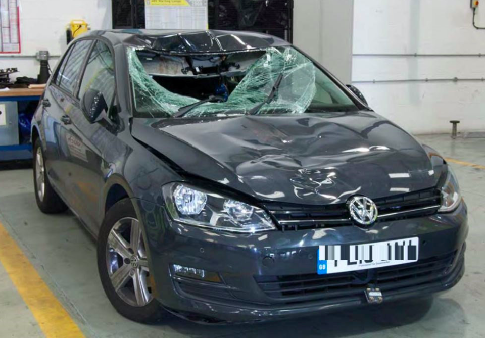 The black Volkswagen Golf driven by Anop Singh was left with a smashed windscreen. (SWNS)