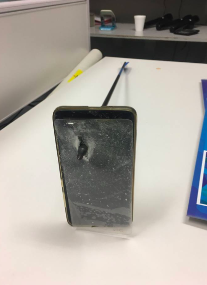 The arrow pierced the phone, saving the man from serious injury. Source: NSW Police