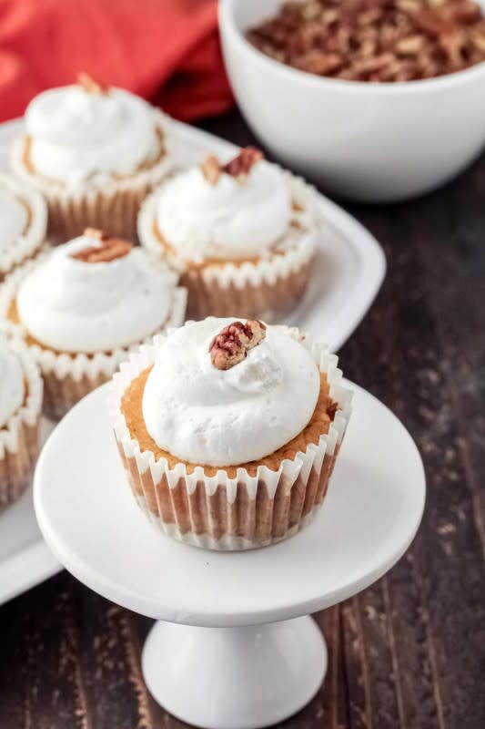 <p>Mile High Mitts</p><p>Skinny mini pumpkin cheesecakes filled with pumpkin puree and pumpkin spice, complete with a crust made of chopped pecans and maple syrup.</p><p><strong>Get the recipe: <a href="https://www.milehighmitts.com/skinny-mini-pumpkin-cheesecakes/" rel="nofollow noopener" target="_blank" data-ylk="slk:Skinny Mini Pumpkin Cheesecakes;elm:context_link;itc:0;sec:content-canvas" class="link ">Skinny Mini Pumpkin Cheesecakes</a></strong></p>