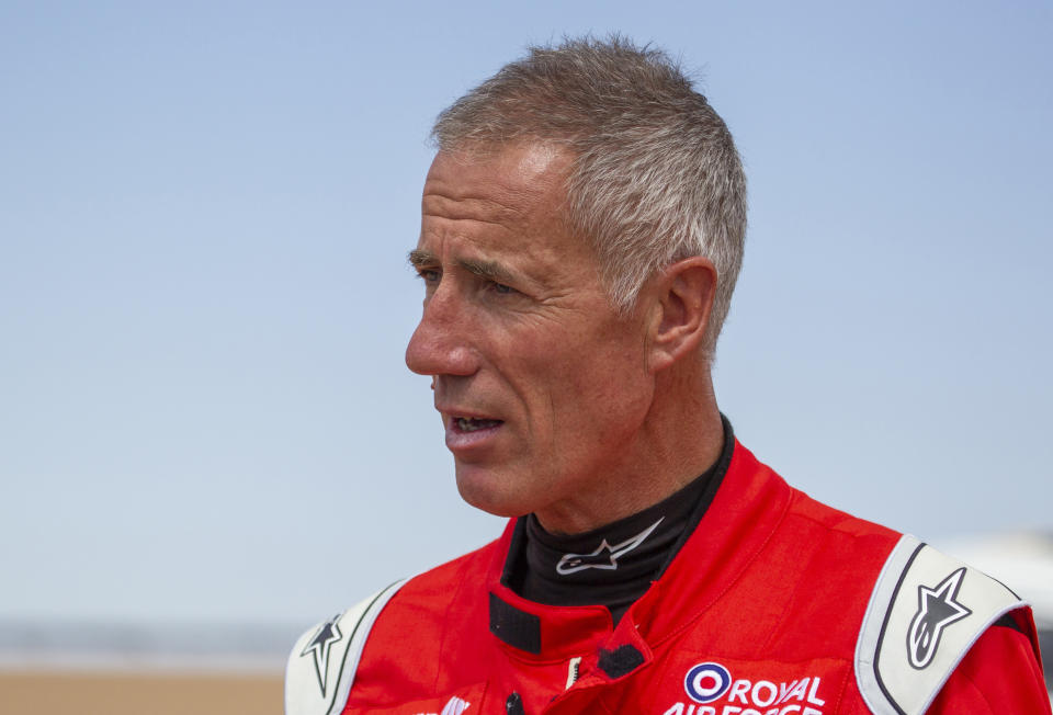 In this handout photo provided by Bloodhound, driver Andy Green is photographed at the Hakskeenpan track in South Africa during trials to set a land speed record, Friday, Nov. 8, 2019. Hitting 501 miles per hour on the South Africa’s northern desert, the Bloodhound became one of the world’s 10 fastest cars this week, on target for its goal to set a new land speed record. A jet that stays on earth, Bloodhound’s next goal is to reach 550 miles per hour, possibly in the coming week. (Charlie Sperring/Bloodhound via AP)