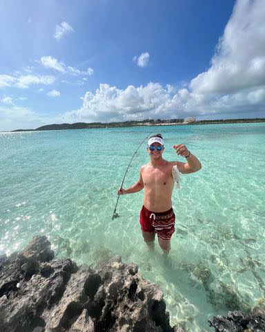 <p>Jenna Purdy/Instagram</p> Brock Purdy holding up his catch while fishing in Turks and Caicos