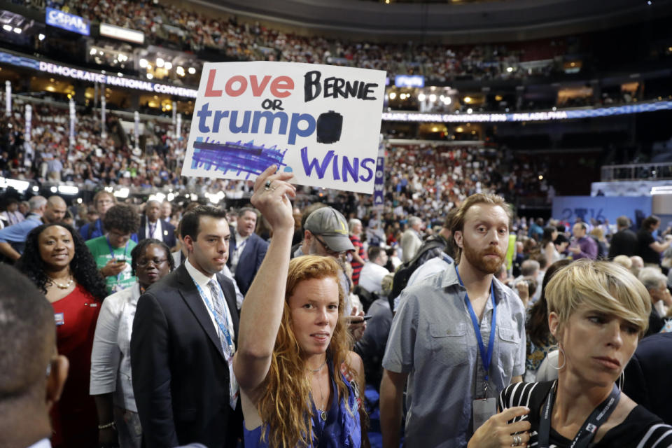 <p>A supporter for Former Democratic Presidential candidate, Sen. Bernie Sanders, I-Vt., holds up a sign during the first day of the Democratic National Convention in Philadelphia on July 25, 2016. (AP Photo/Matt Rourke)</p>