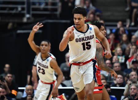 FILE PHOTO: March 30, 2019; Anaheim, CA, USA; Gonzaga Bulldogs forward Brandon Clarke (15) and guard Zach Norvell Jr. (23) react after a three point basket against the Texas Tech Red Raiders during the first half in the championship game of the west regional of the 2019 NCAA Tournament at Honda Center. Mandatory Credit: Robert Hanashiro-USA TODAY Sports