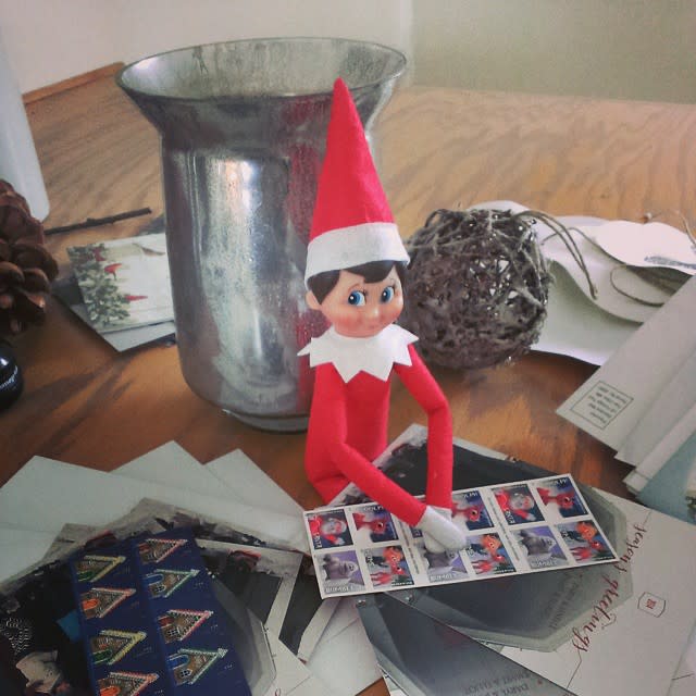 Elf on the Shelf Prepping Christmas Cards