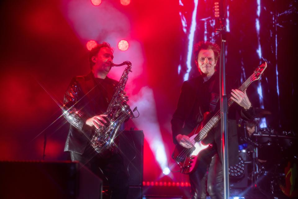 Saxophonist Simon Willescroft (left) joins John Taylor of Duran Duran onstage at the band's Future Past tour in Atlanta on June 15, 2023.