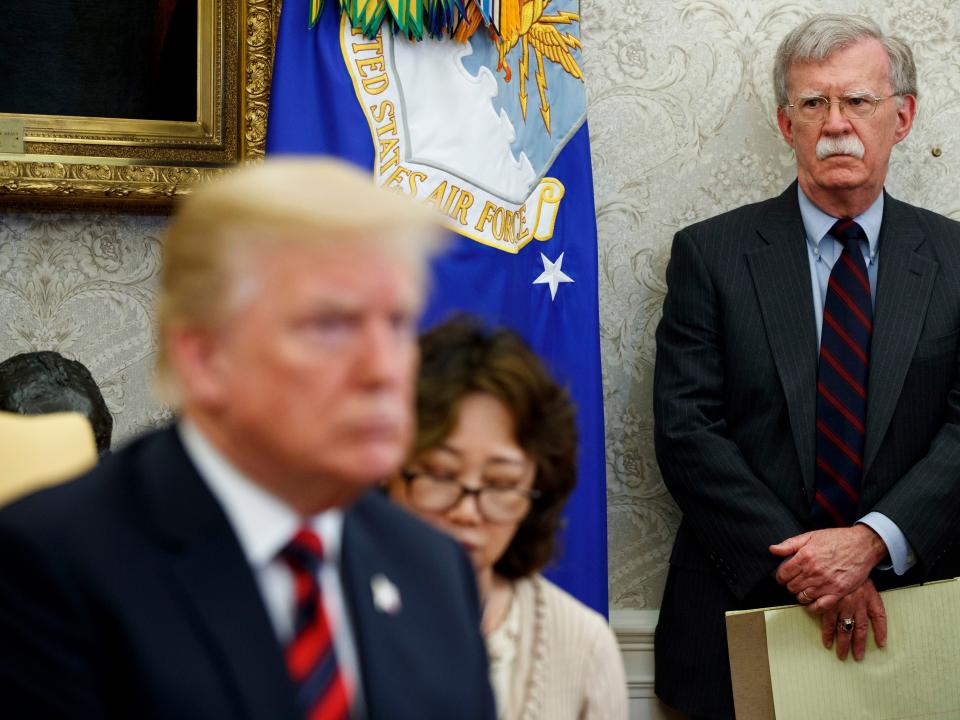 Donald Trump and John Bolton.