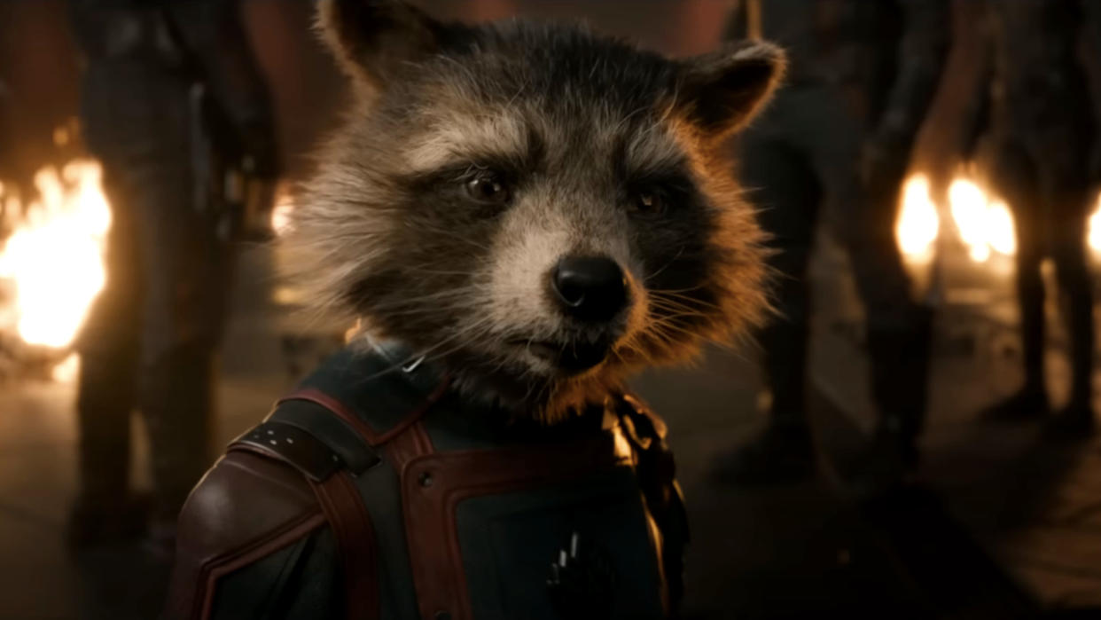  Rocket stands defiantly while surrounded by friends and fire in Guardians of the Galaxy: Vol 3. 