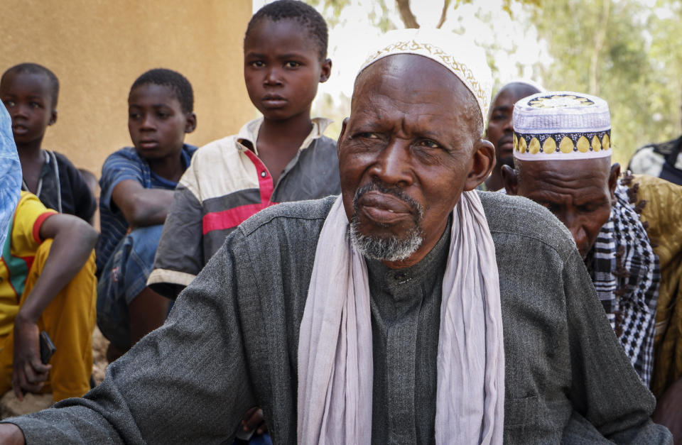 In this photo taken Sunday, March 29, 2020, Boureima Gassambe speaks to The Associated Press at the makeshift camp for the internally displaced where he and around 600 others live in an abandoned school on the outskirts of the capital, Ouagadougou, Burkina Faso. The rapid spread of the coronavirus has raised fears about the world’s refugees and internally displaced people, many of whom live in war-ravaged countries that are ill-equipped to test for the virus or contain a possible outbreak. “We ran away from the terrorists and came here, but now there’s the coronavirus, and we don’t know what will happen,” said Gassambe. (Photo/Sam Mednick)