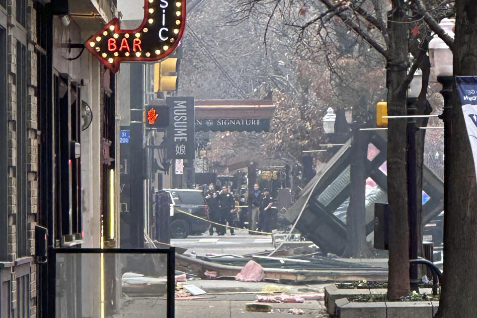 First responders work the scene after an explosion at the Sandman Signature hotel on Monday, Jan. 8, 2024, in Fort Worth, Texas. (Cameron Arnold via AP)