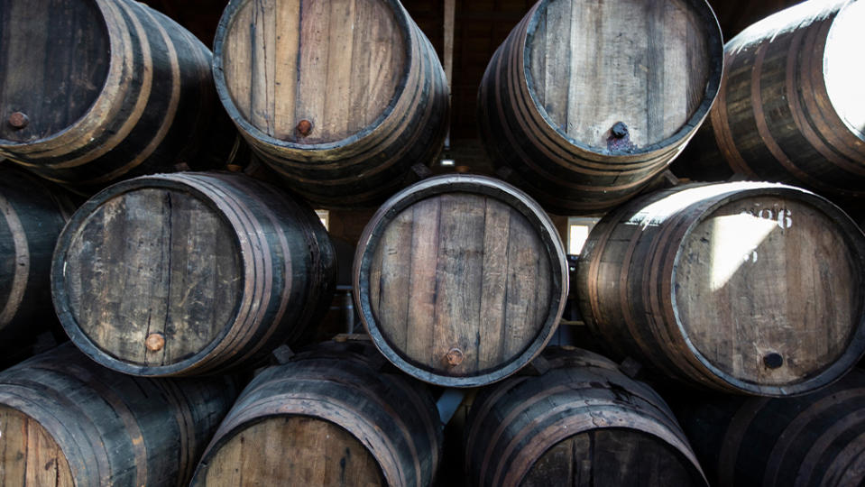 Stack of Port Wine barrel in a wine cellar -