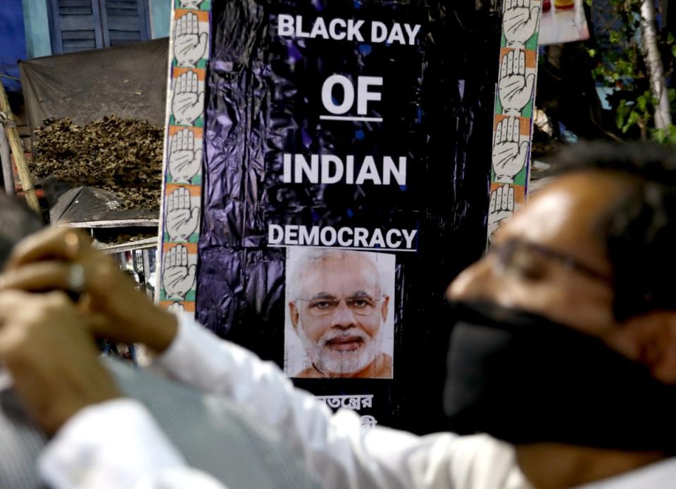 A protest banner in Kolkata on Friday (EPA)