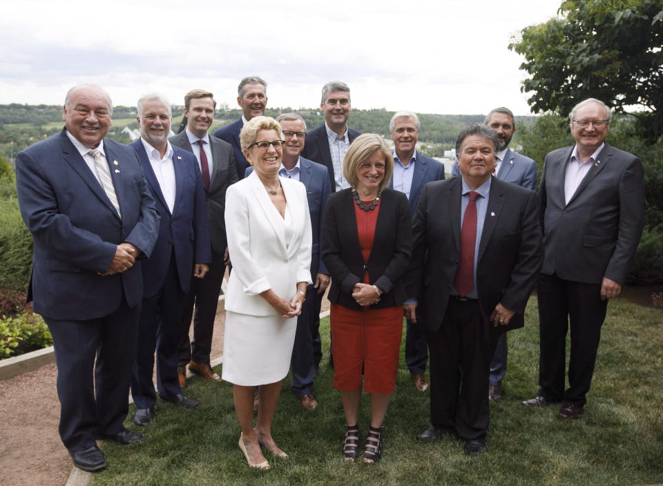 Canada’s premiers pose for a group photo at the Council of the Federation in July. Photo from CP Images