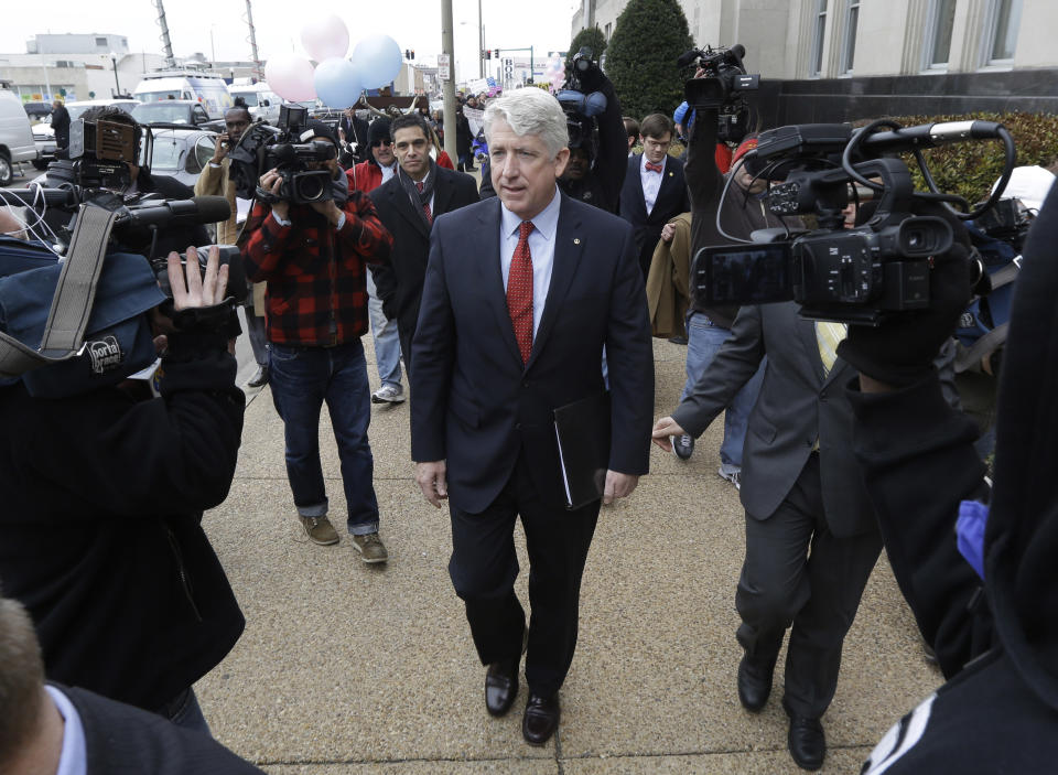 Virginia Attorney General Mark Herring leaves Federal Court after a hearing on Virginia's ban on gay marriage in Norfolk, Va., Tuesday, Feb. 4, 2014. Herring the state's newly elected Democratic attorney general has already decided to side with the plaintiffs and will not defend the ban. (AP Photo/Steve Helber)