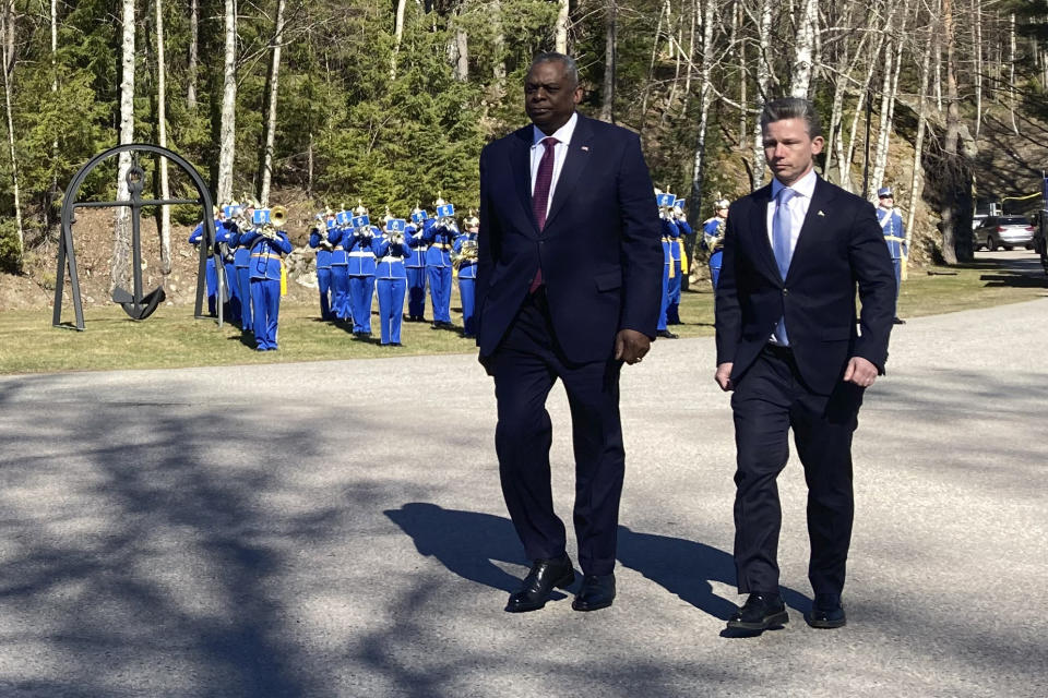 Defense Secretary Lloyd Austin visits Musko Naval Base in Sweden and meets with Swedish Defense Minister Pål Jonson, right, Wednesday, April 19, 2023. Austin is the first U.S. defense chief to go to Sweden since then-secretary William Cohen went in 2000. His visit comes as Sweden's admission to NATO remains stalled by opposition from Turkey and Hungary. (AP Photo/Lolita Baldor)