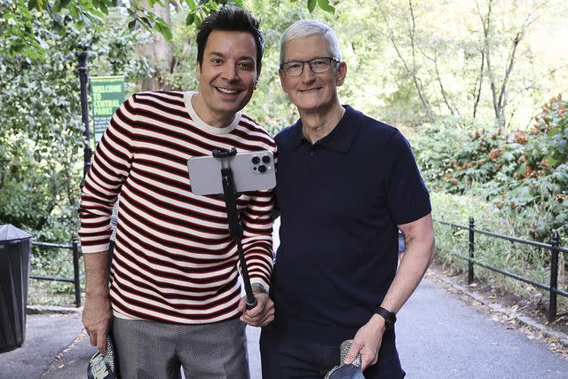 <p>Theo Wargo/NBC via Getty</p> Jimmy Fallon and Tim Cook