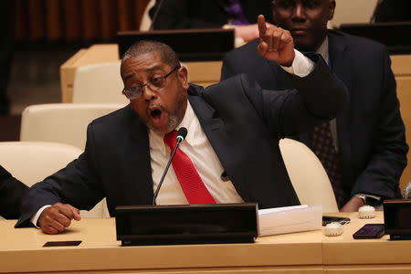 Cuban diplomats protest the launch of a U.S. campaign on Cuban political prisoners at the United Nations in New York, U.S., October 16, 2018. REUTERS/Shannon Stapleton