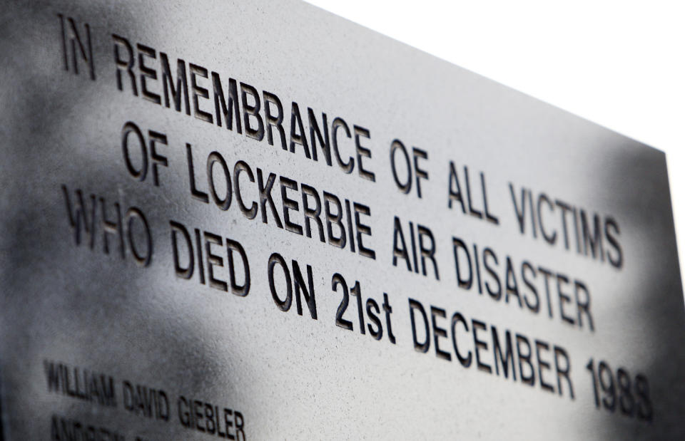 FILE - Part of the main memorial stone to the victims of the Pan Am flight 103 bombing in the garden of remembrance at Dryfesdale Cemetery, near Lockerbie, Scotland, Saturday Dec. 20, 2008. U.S. and Scottish authorities said Sunday, Dec. 11, 2022 that the Libyan man suspected of making the bomb that destroyed a passenger plane over Lockerbie, Scotland, in 1988 is in U.S. custody. (AP Photo/Scott Heppell, File)