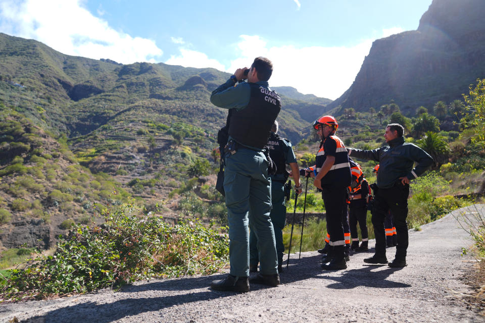 Emergency workers near the village of Masca, Tenerife, where the search for missing British teenager Jay Slater continues. (PA)