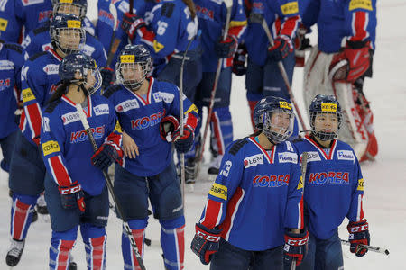 South Korean women's ice hockey player Marissa Brandt (bottom, 2nd from R) skates with her teammates after a game at Quinnipiac University in Hamden, Connecticut, U.S., December 28, 2017. REUTERS/Brian Snyder