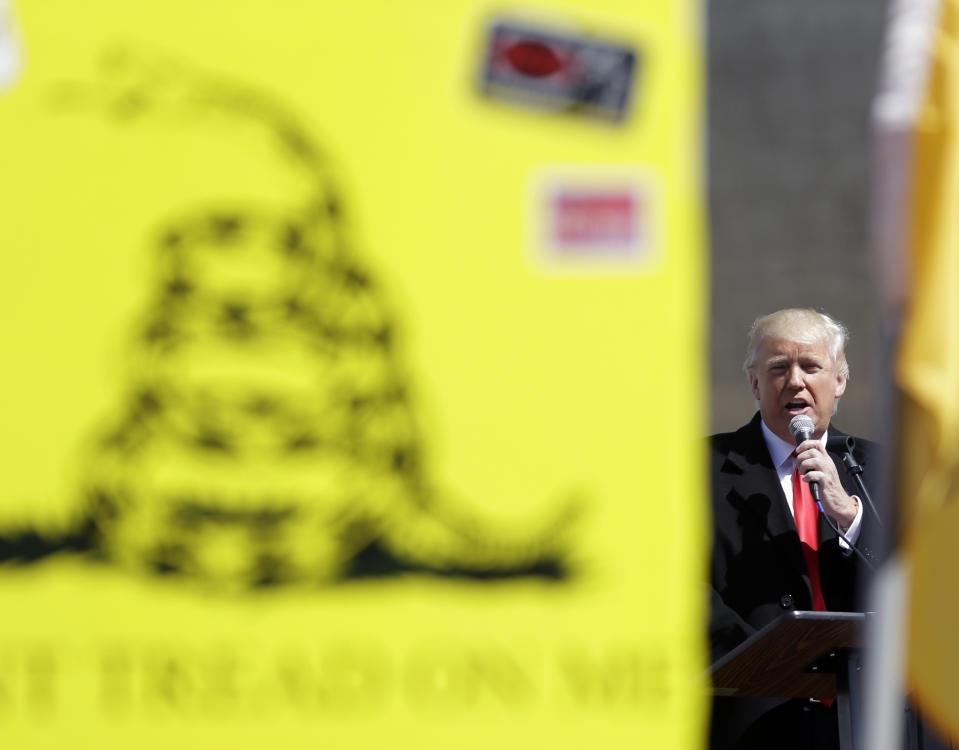 Donald Trump speaks during a gun rights rally at the Empire State Plaza on Tuesday, April 1, 2014, in Albany, N.Y. Activists are seeking a repeal of a 2013 state law that outlawed the sales of some popular guns like the AR-15. The law championed by Gov. Andrew Cuomo has been criticized as unconstitutional by some gun rights activists. (AP Photo/Mike Groll)