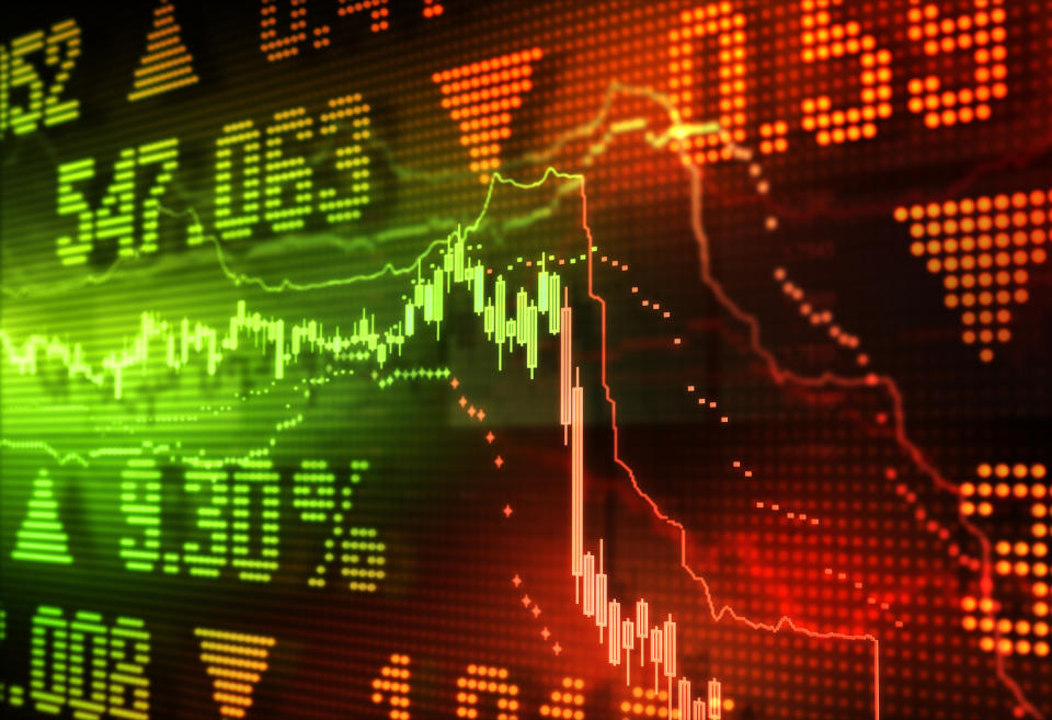 Stock market charts and numbers, green indicating gains on left, red indicating losses on right.