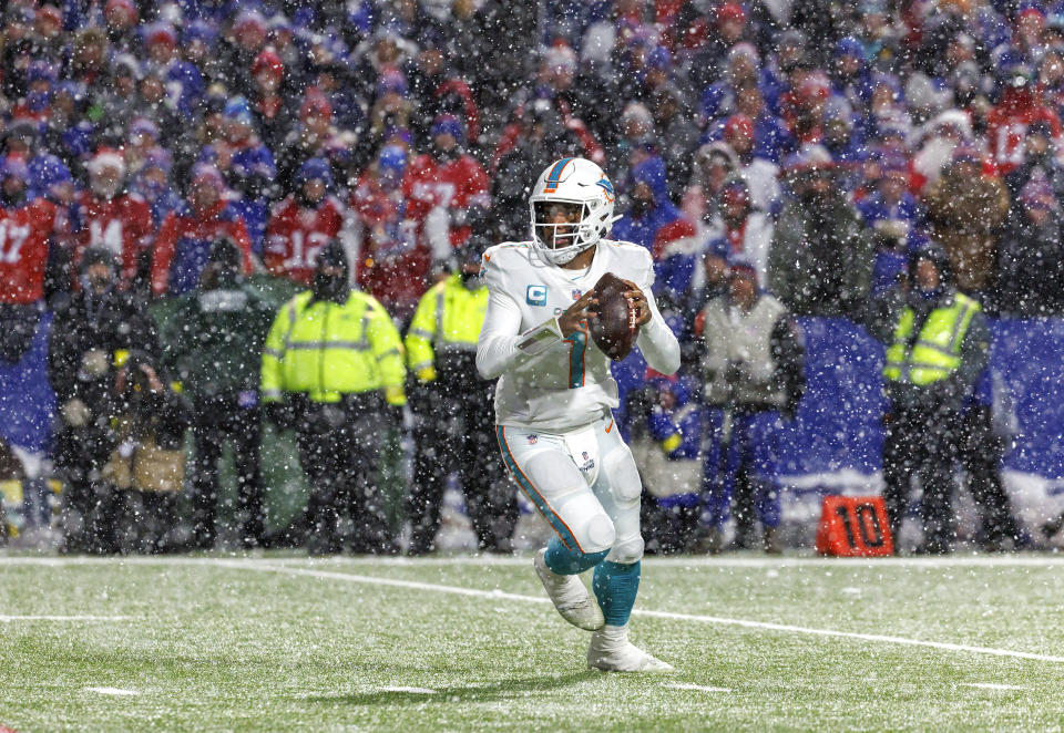 Miami Dolphins quarterback Tua Tagovailoa (1) sets up to pass during fourth quarter of an NFL football game against the Buffalo Bills at Highmark Stadium on Saturday, Dec. 17, 2022 in Orchard Park, N.Y. (David Santiago/Miami Herald via AP)