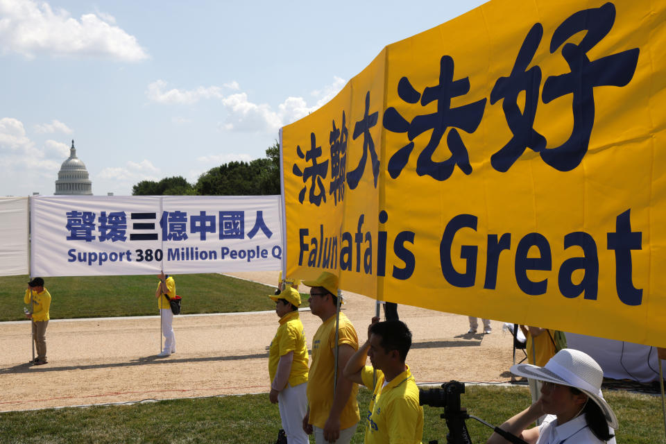 WASHINGTON, DC - JULY 16:  Falun Gong practitioners and supporters take part in an annual rally and demonstration at the National Mall July 16, 2021 in Washington, DC. Members of Falun Gong held the event against China government’s persecution of the group and its practitioners. (Photo by Alex Wong/Getty Images)