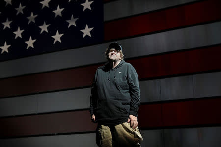 Michael Moore poses for a portrait at the site of his one-man Broadway show at the Belasco Theatre in Manhattan, New York, U.S., August 17, 2017. REUTERS/Shannon Stapleton