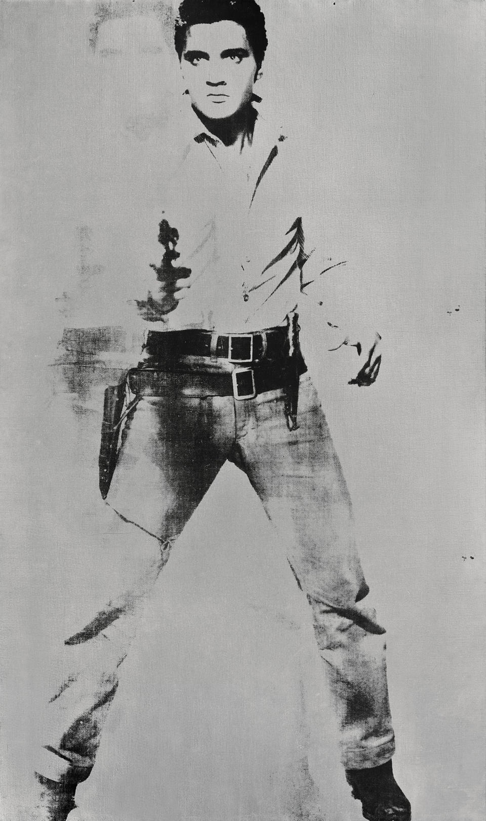 FILE - This undated image provided by Sotheby's shows Andy Warhol's portrait of Elvis Presley depicted as a cowboy. The painting, with a silver background, “Double Elvis [Ferus Type]” is estimated to sell for between $30 million to $50 million at Sotheby’s in New York on Wednesday May 9, 2012. (AP Photo/Sotheby's, File)