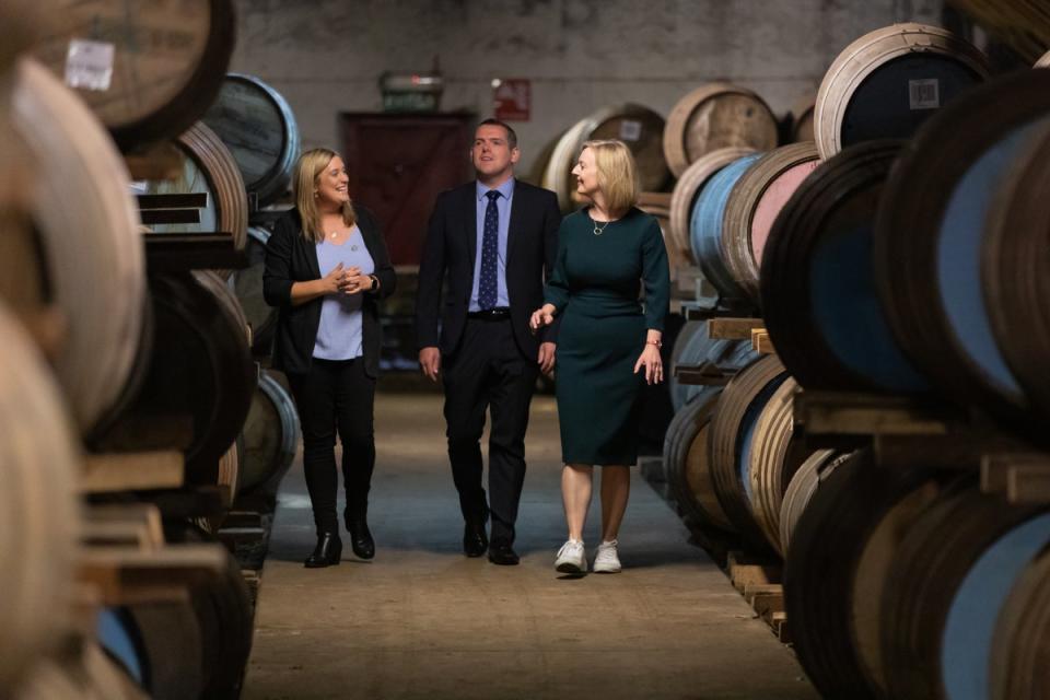 Distilleries production manager Laura Tolmie (left) gives Liz Truss and Scottish Conservative leader Douglas Ross a tour during a campaign visit to the BenRiach Distillery in Speyside (Paul Campbell/PA) (PA Wire)