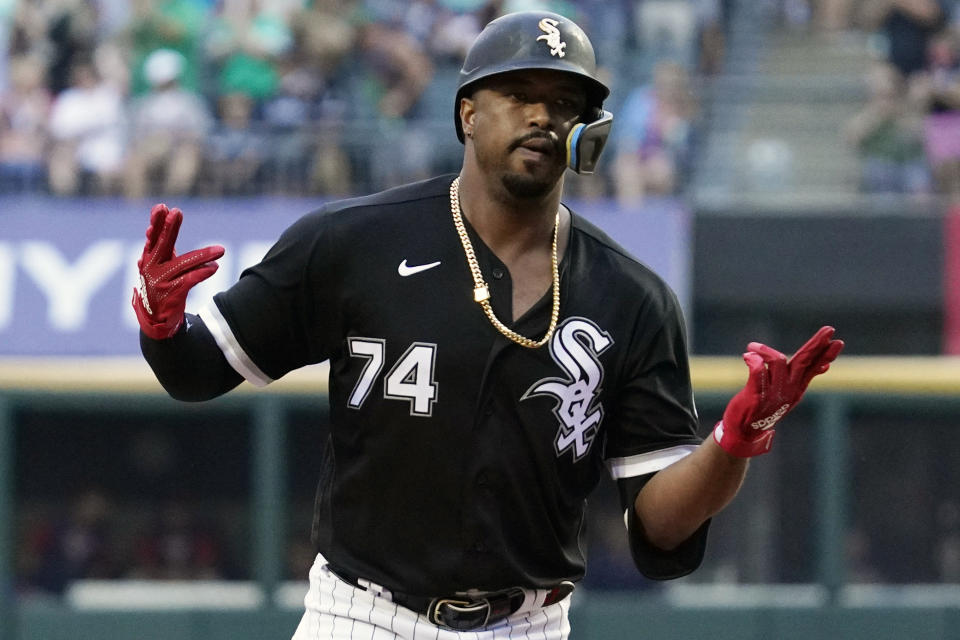 Chicago White Sox's Eloy Jimenez reacts as he rounds the bases after hitting a three-run home run during the first inning of a baseball game against the Minnesota Twins in Chicago, Saturday, Sept. 3, 2022. (AP Photo/Nam Y. Huh)