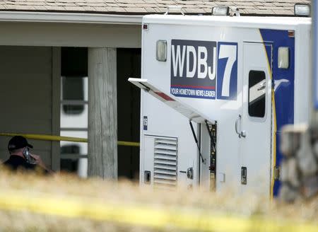 The WDBJ7 live truck is seen outside of the Bridgewater Plaza in Moneta, Virginia, August 26, 2015. REUTERS/Chris Keane