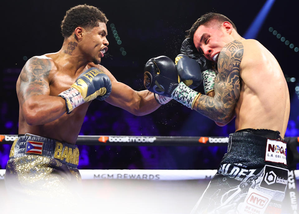 LAS VEGAS, NEVADA - APRIL 30: Shakur Stevenson (L) and Oscar Valdez (R) exchange punches during their WBC and WBO junior lightweight championship at MGM Grand Garden Arena on April 30, 2022 in Las Vegas, Nevada. (Photo by Mikey Williams/Top Rank Inc via Getty Images)