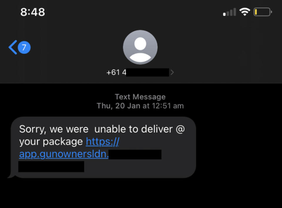 A text message scam asking the recipient to click on a URL to arrange delivery of a package.