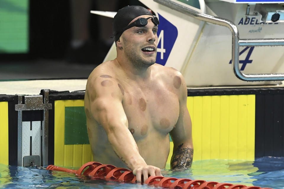 Kyle Chalmers looks on after swimming the Men's 100-meter Freestyle Heats at the Australian Swimming Trials for the Tokyo Olympic and Paralympic qualification at the SA Aquatic and Leisure Centre in Adelaide, Australia, Tuesday, June 15, 2021. Olympic champion Chalmers and singer Cody Simpson were listed side-by-side in the promotional billing for a documentary series series ahead of Australia’s Olympic swimming trials. (Dave Hunt/AAP Image via AP)