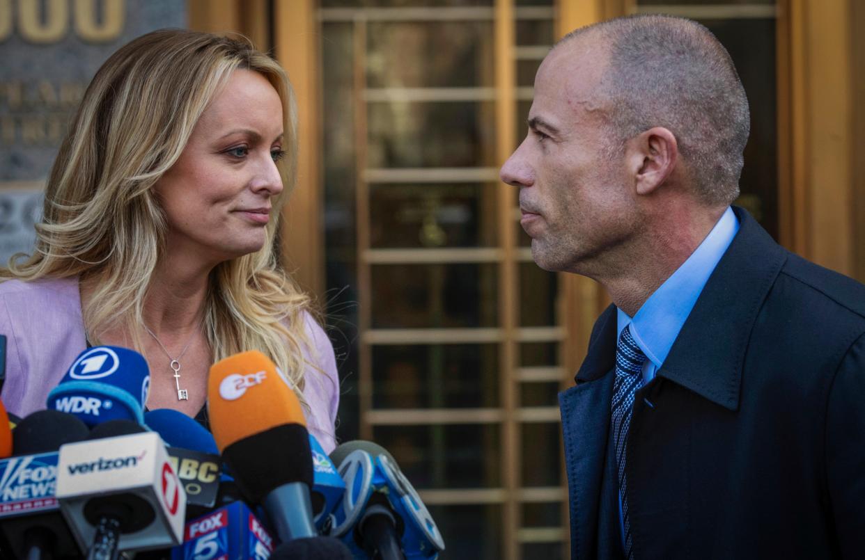 <p>In this April 16, 2018, file photo, adult film actress Stormy Daniels, left, stands with her then lawyer, Michael Avenatti, during a press conference outside federal court in New York. </p> (Associated Press)