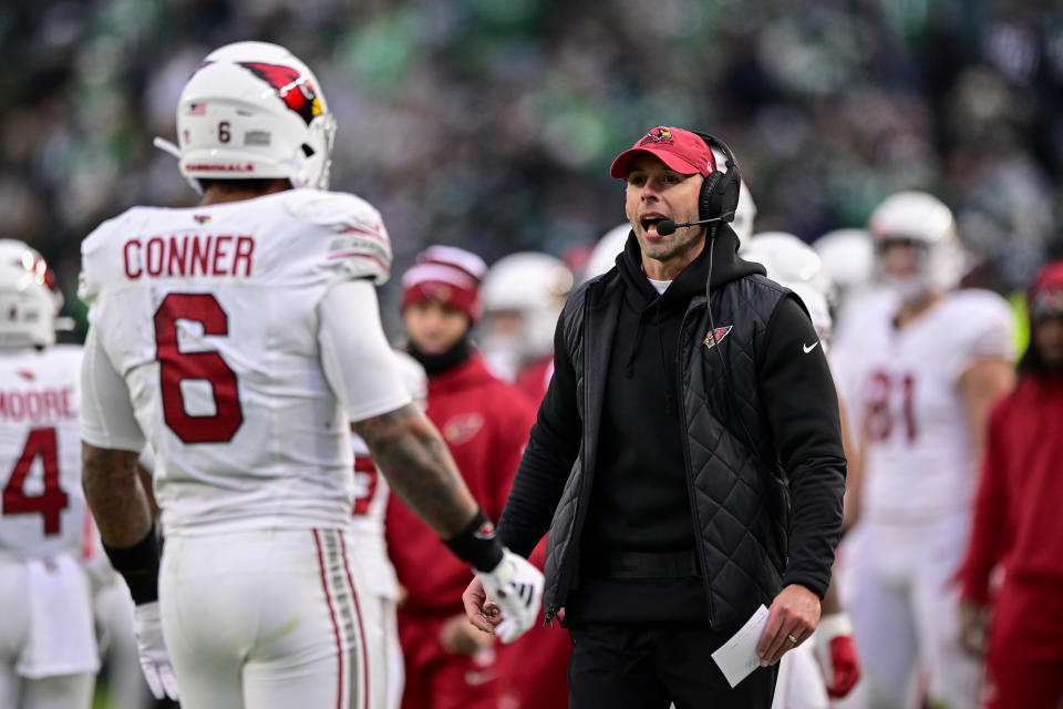 Arizona Cardinals head coach Jonathan Gannon, right, reacts after running back James Conner (6) scored a touchdown against the Philadelphia Eagles during the second half of an NFL football game, Sunday, Dec. 31, 2023, in Philadelphia. The Cardinals won 35-31. (AP Photo/Derik Hamilton)