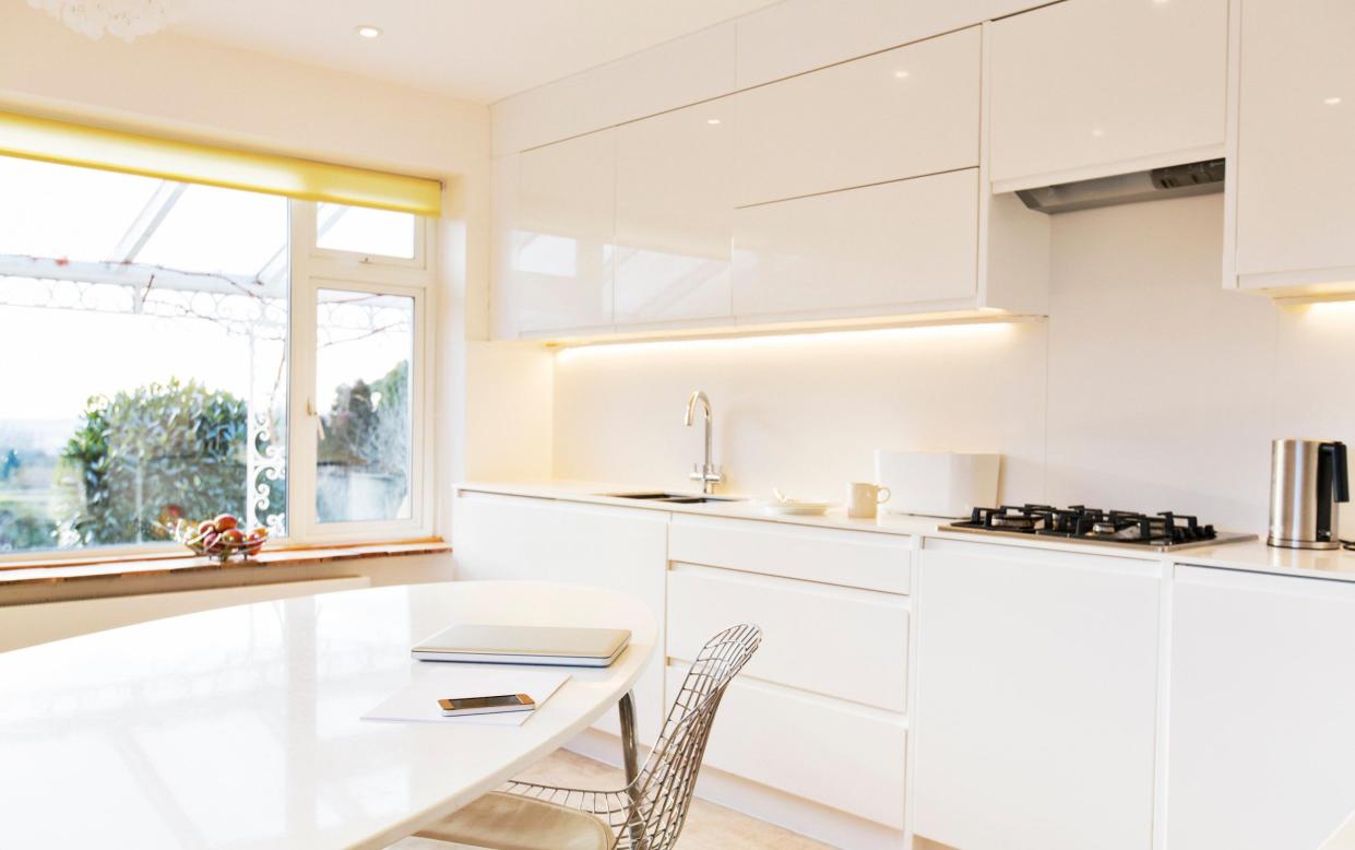 Sleek, white, handleless kitchens denoted a certain level of wealth in the Noughties