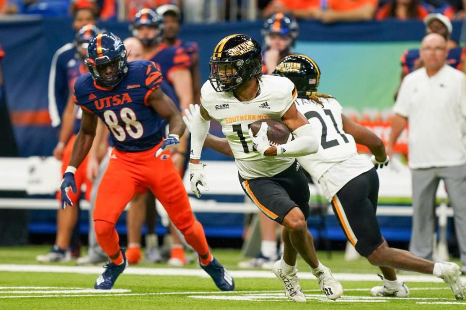 Nov 13, 2021; San Antonio, Texas, USA;  Southern Miss Golden Eagles defensive back Eric Scott Jr. (12) returns an interception in the first quarter against the UTSA Roadrunners at the Alamodome. 