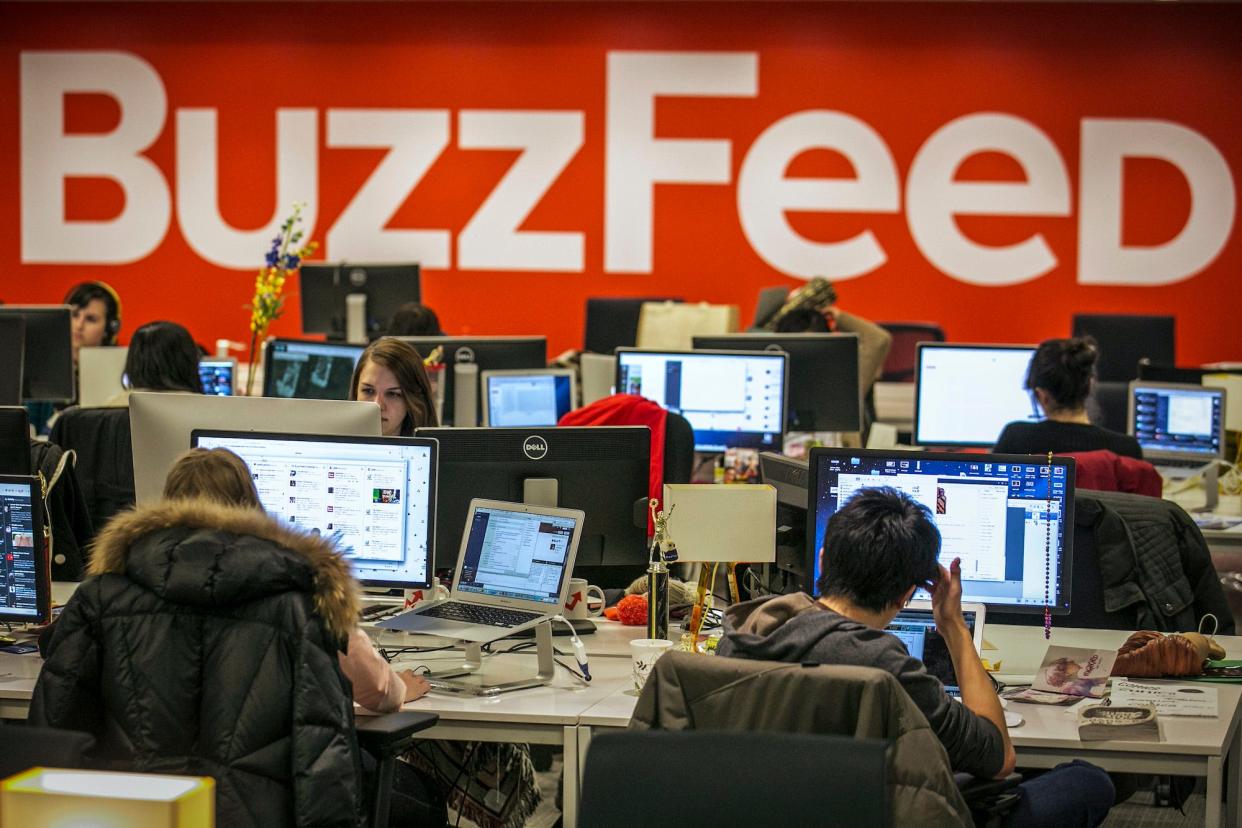 BuzzFeed employees working at the office