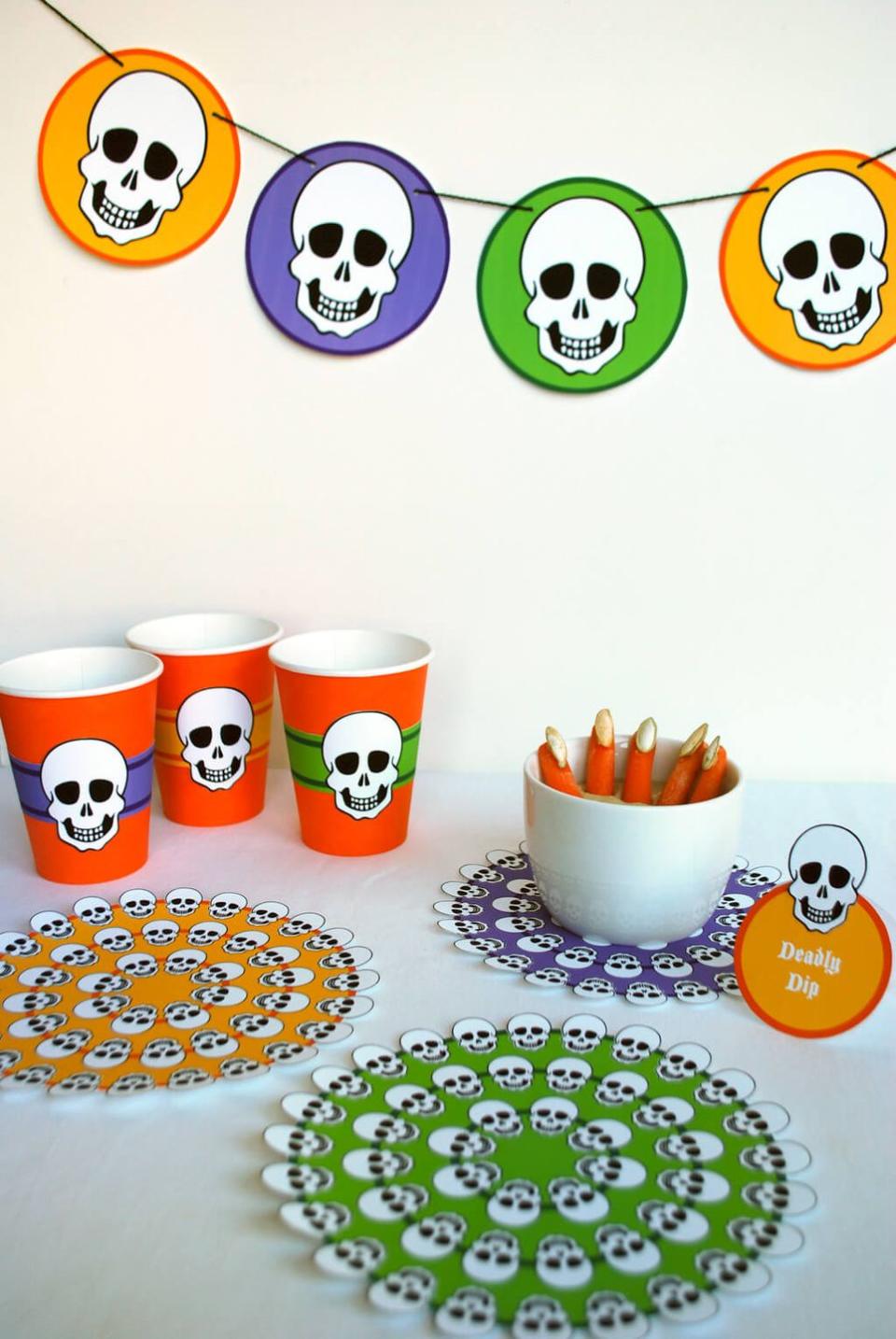 <p>These free printable decorations will add festive flair to your Halloween meal or party. The collection includes skeleton doilies, a Halloween banner, cup wraps and holiday food labels you can customize to take your theme-y menu to the next level.</p><p><em><a href="https://www.merrimentdesign.com/skeleton-free-printable-halloween-party-decorations-dinner-table.php" rel="nofollow noopener" target="_blank" data-ylk="slk:Get the printables at Merriment Design »;elm:context_link;itc:0;sec:content-canvas" class="link ">Get the printables at Merriment Design »</a></em></p>
