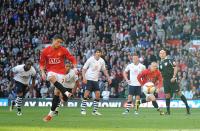 Tottenham were winning 2-0 when Manchester United's Cristiano Ronaldo won a penalty. United went on to win the game 5-2, but did this turn the game and was there contact? (25 April 2009)