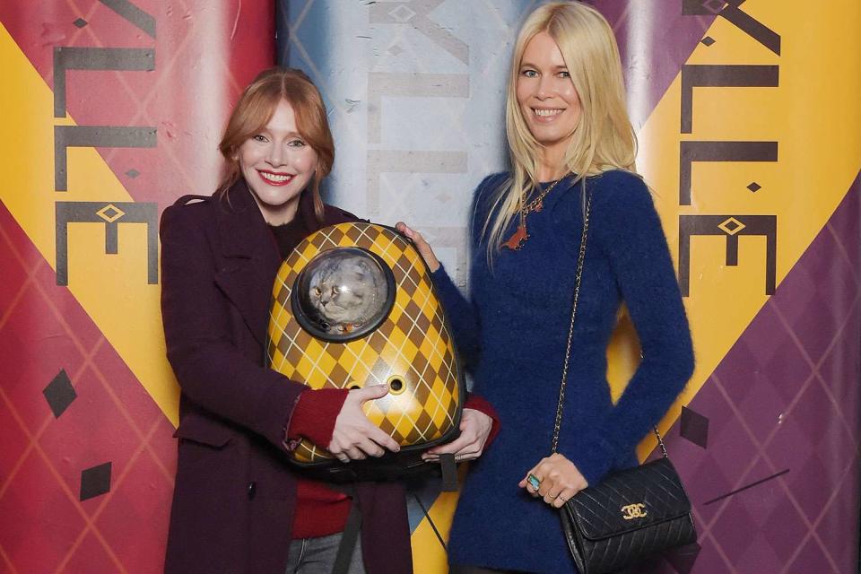 <p>Antony Jones/Getty</p> Bryce Dallas Howard and Claudia Schiffer at 