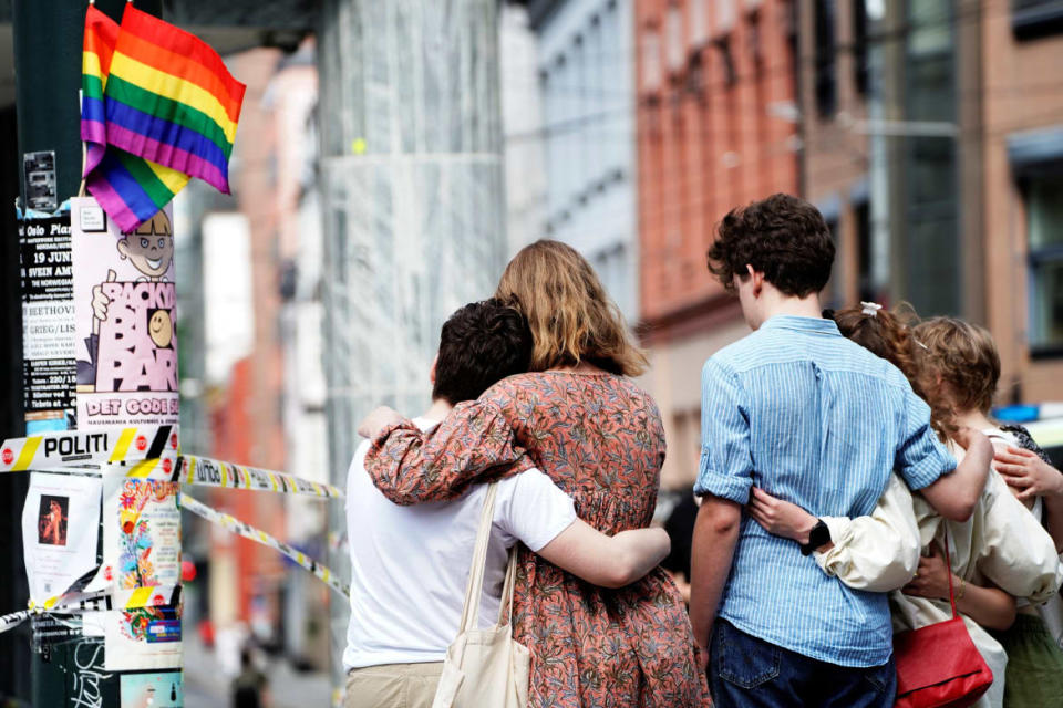 <div class="inline-image__caption"><p>People embrace near the police line following a shooting at the London Pub, a popular gay bar and nightclub, in central Oslo, Norway.</p></div> <div class="inline-image__credit">NTB</div>