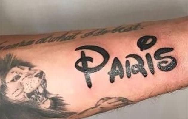 Chris even has Paris' name tattooed on him! Source: Instagram