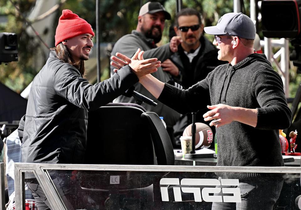 Utah quarterback Cam Rising greets AJ Hawk and others on the Pat McAfee Show at the University of Utah on Friday, Oct. 27, 2023. | Scott G Winterton, Deseret News