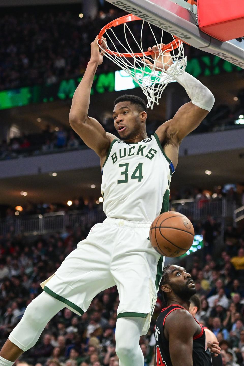 Bucks forward Giannis Antetokounmpo dunks the ball against the Bulls in the third quarter at Fiserv Forum.