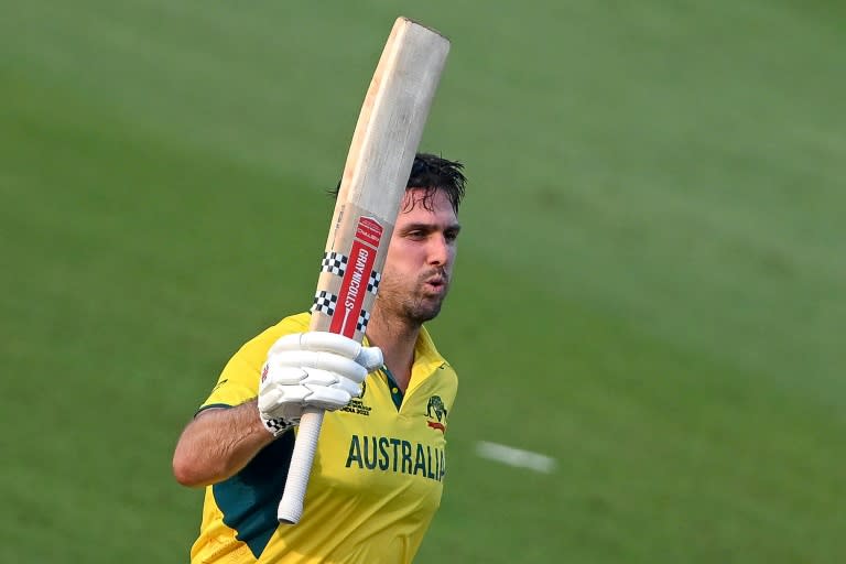 Ton-up: Australia's Mitchell Marsh celebrates his century against Bangladesh (Punit PARANJPE)