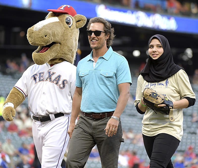 <p>The native Texan took the field at a Texas Rangers baseball game, along with the high school student who tossed out the first pitch and the team mascot, at a game against the Seattle Mariners. (Photo: Max Faulkner/Fort Worth Star-Telegram/TNS via Getty Images) </p>